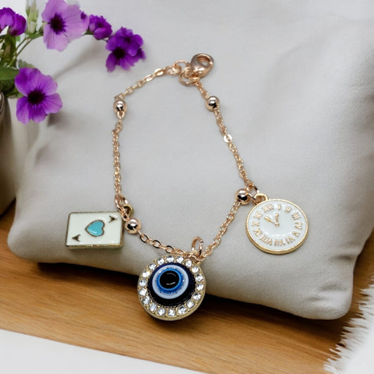 Evil eye symbol Anti tarnish bracelet with 2 quirky charms