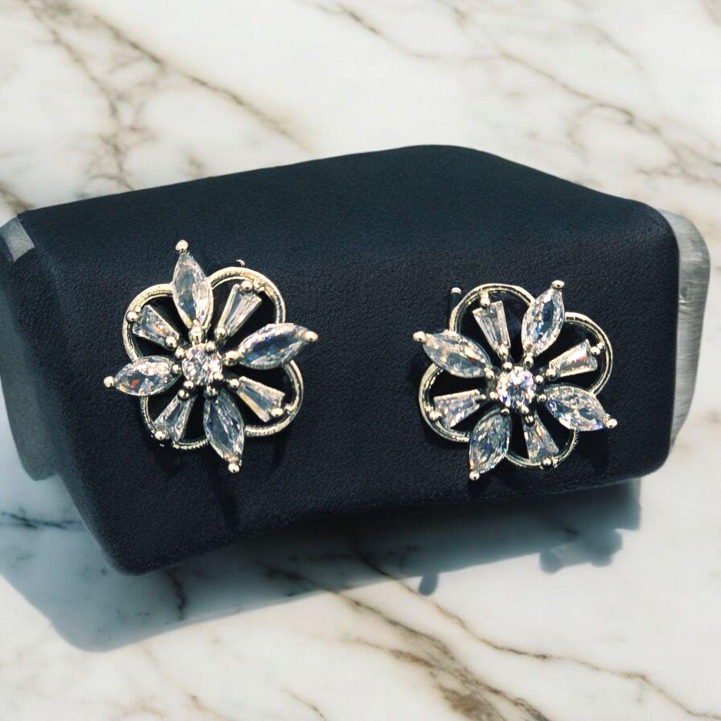 GLOWING FLOWER AMERICAN DIAMOND STUDDS EARRING
