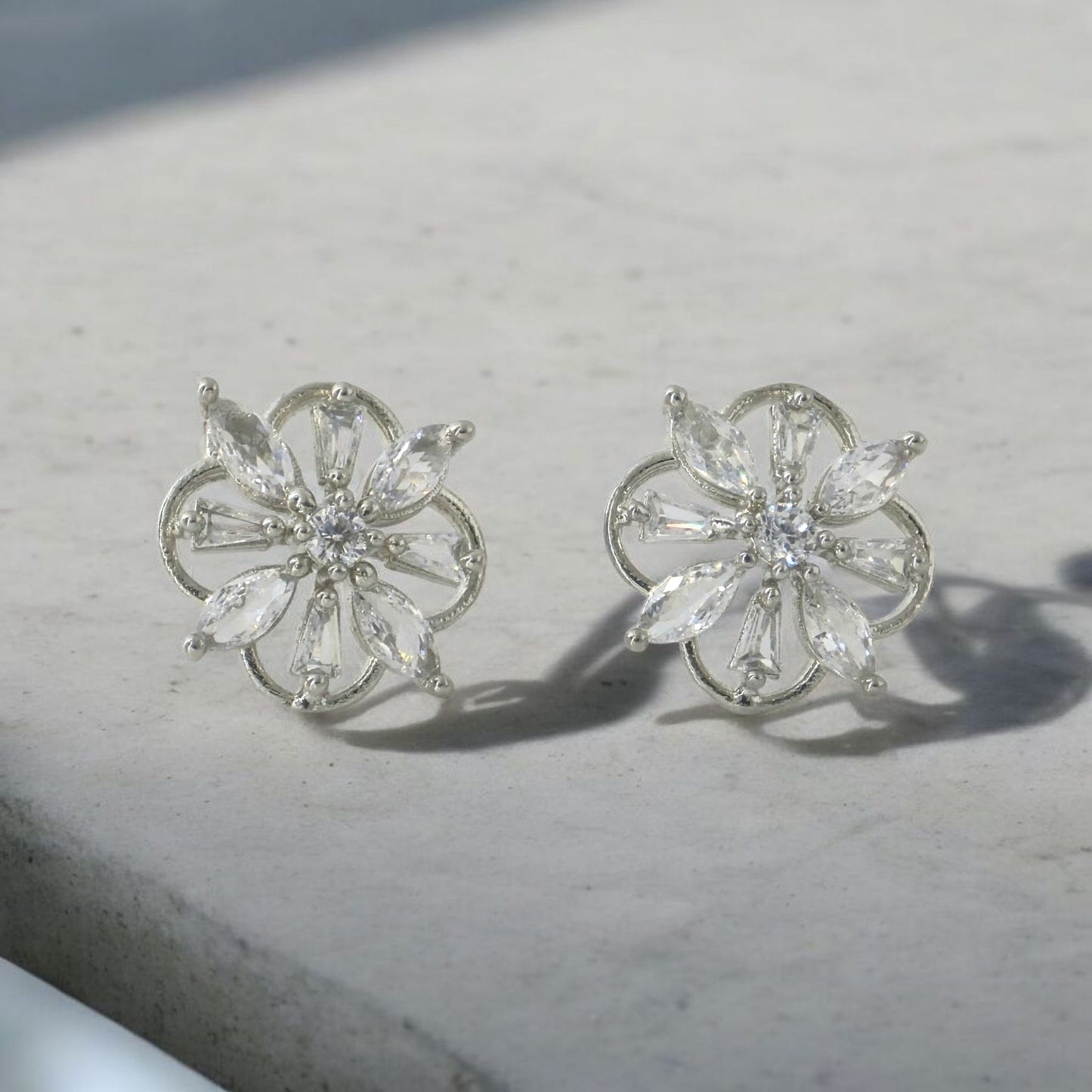 GLOWING FLOWER AMERICAN DIAMOND STUDDS EARRING
