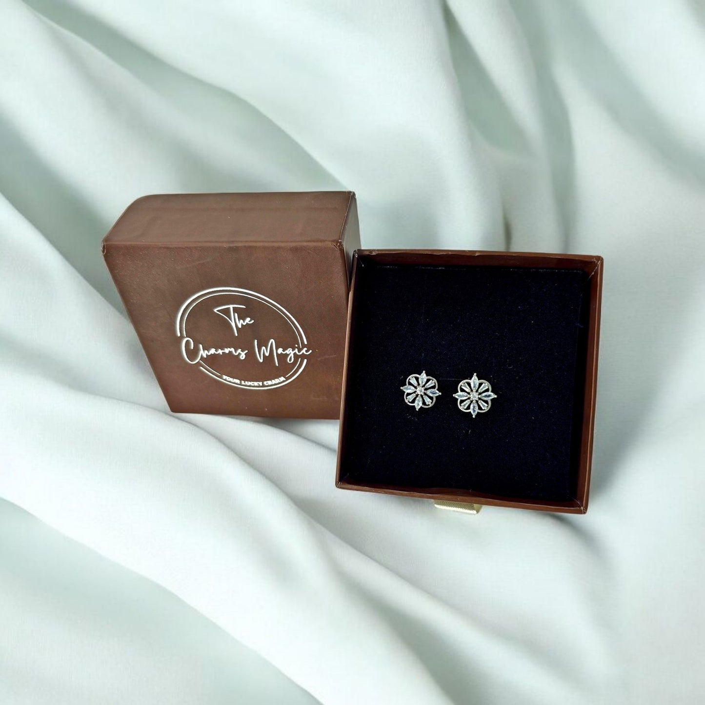 GLOWING FLOWER AMERICAN DIAMOND STUDDS EARRING