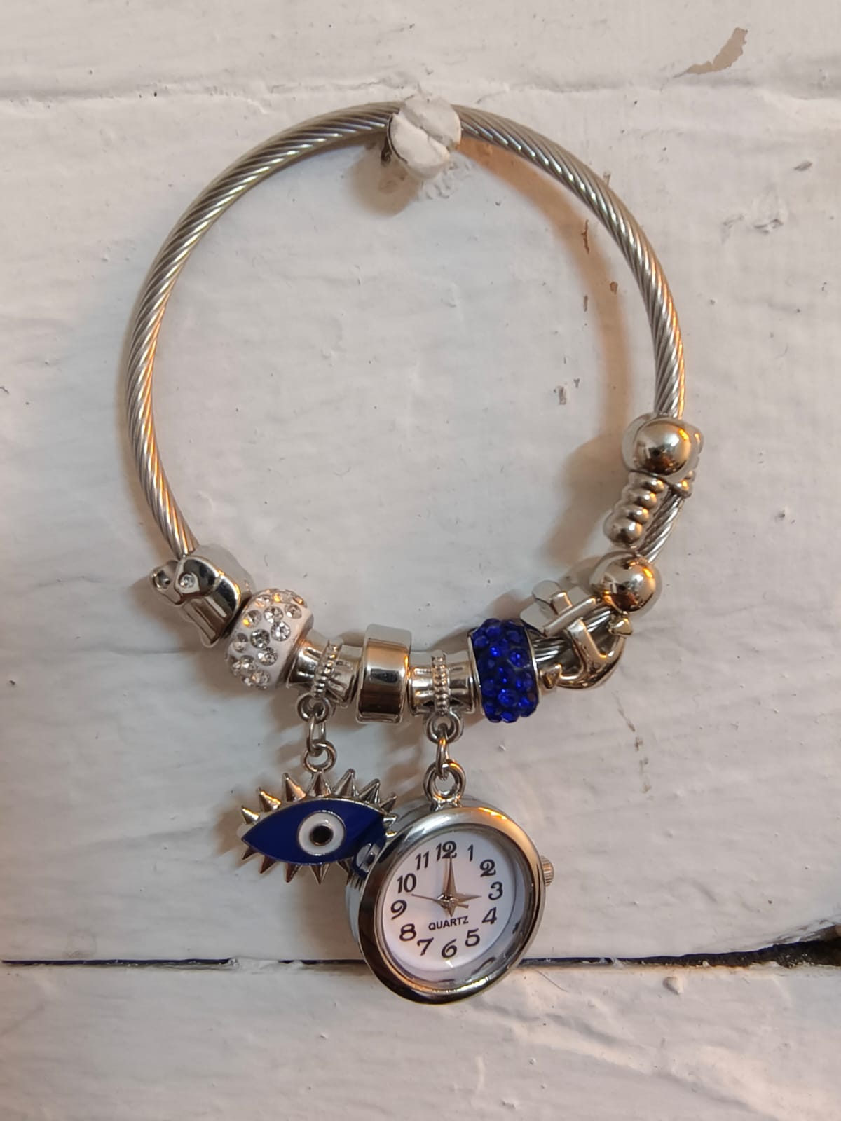 Silver Bracelet Kada with Multiple charms and a Beautiful Nostalgic Watch